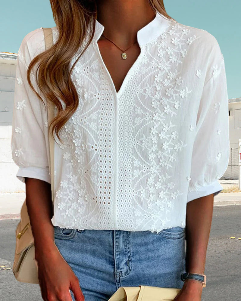 White V-neck short sleeve blouse detail view
