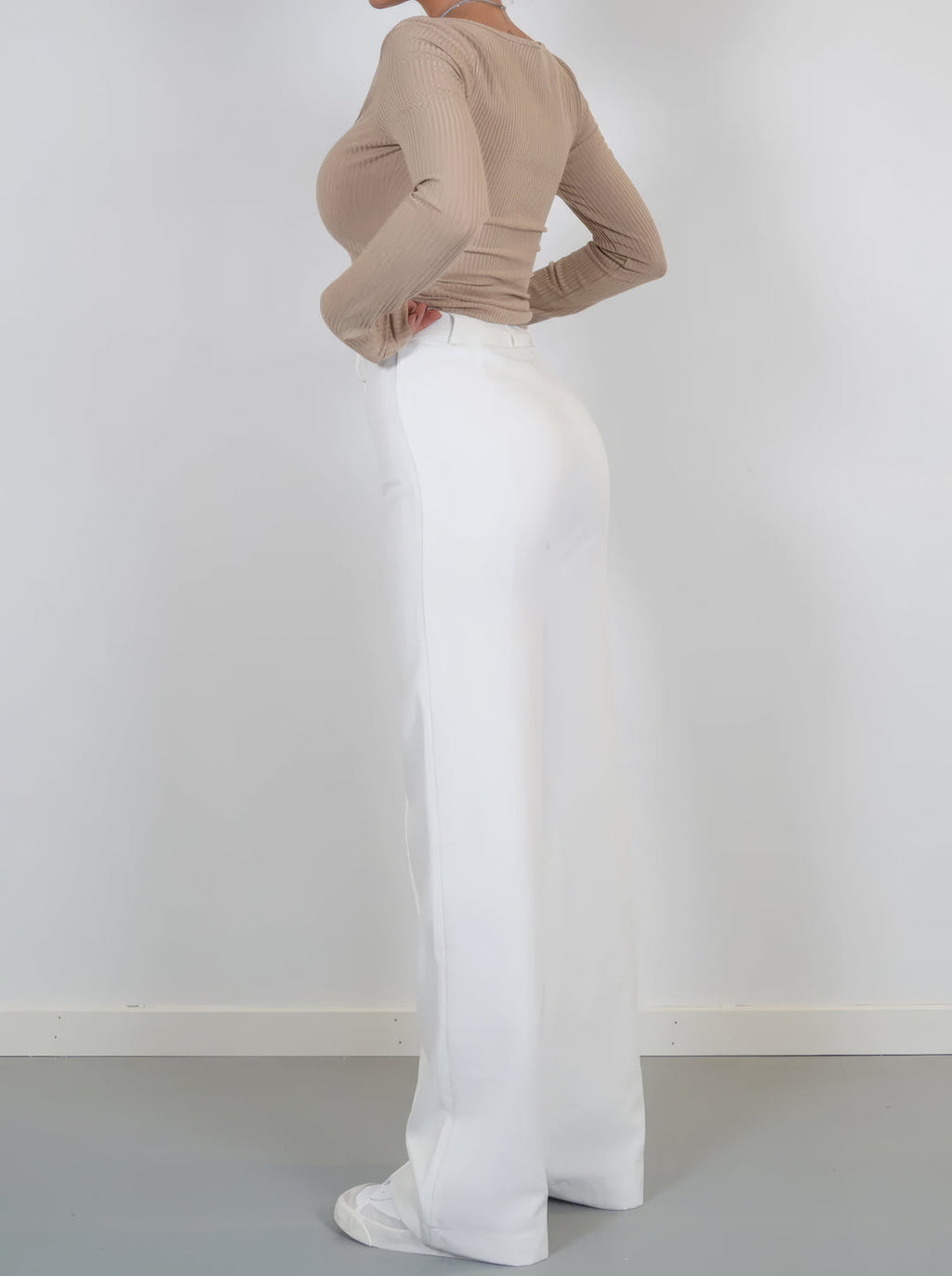 Wide-leg trousers close-up detail