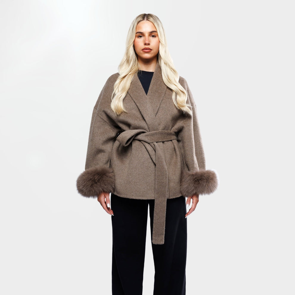 Brown winter coat with faux fur trim, front view