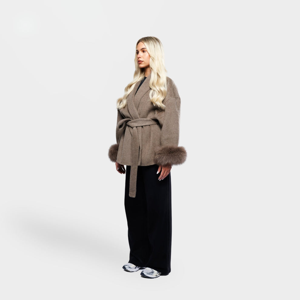 Brown winter coat side view with tailored fit